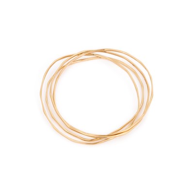 Lot 519 - FOUR 9 CARAT GOLD FACETED THIN BANGLES