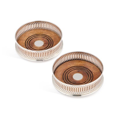 Lot 277 - A PAIR OF ELIZABETH II SILVER COASTERS