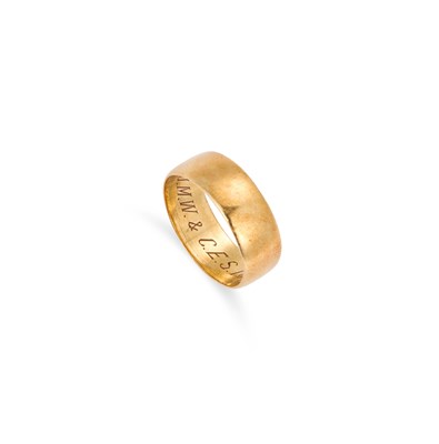 Lot 524 - AN 18 CARAT GOLD BROAD WEDDING BAND RING