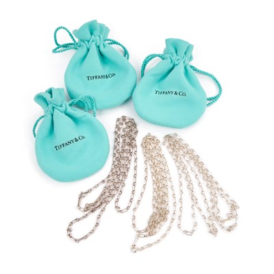Lot 493 - TIFFANY & CO, THREE MATCHING SILVER LONG AND SHORT LINK CHAIN NECKLACES