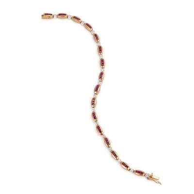 Lot 502 - A 9 CARAT GOLD RUBY AND DIAMOND BRACELET