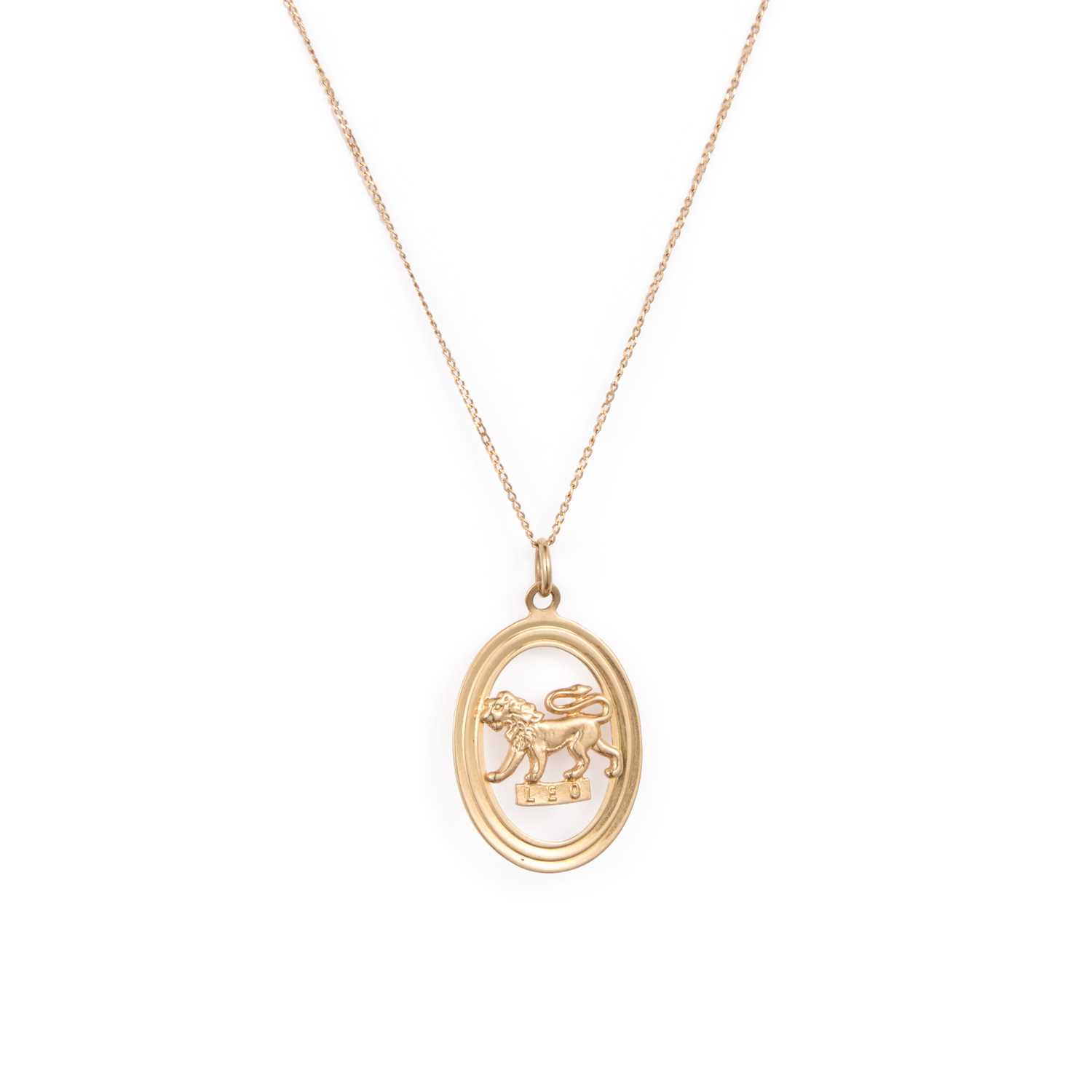 Lot 888 - A 9 CARAT GOLD LEO PENDANT ON CHAIN
