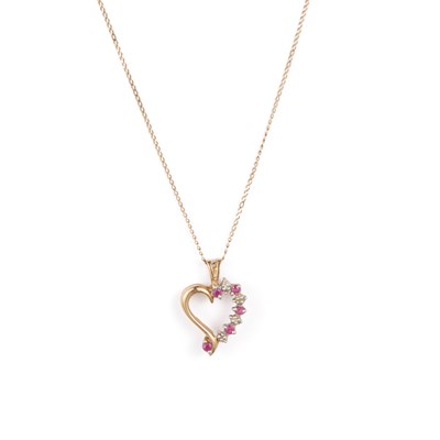 Lot 918 - A 9 CARAT GOLD RUBY AND DIAMOND HEART PENDANT ON CHAIN