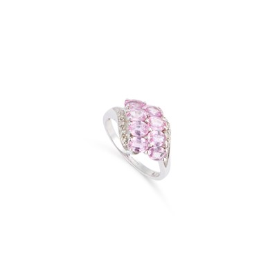 Lot 406 - A 9 CARAT WHITE GOLD PINK SAPPHIRE AND DIAMOND RING