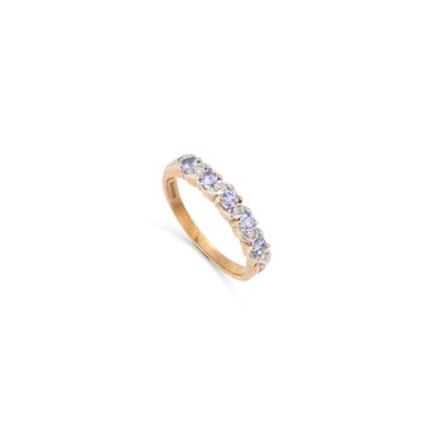 Lot 391 - A 9 CARAT GOLD TANZANITE AND DIAMOND HALF HOOP RING