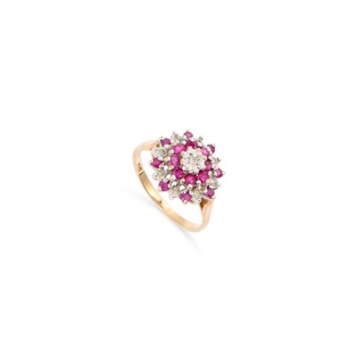 Lot 520 - A 9 CARAT GOLD RUBY AND DIAMOND CLUSTER RING