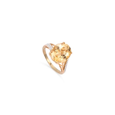 Lot 505 - A 9 CARAT GOLD CITRINE AND DIAMOND RING