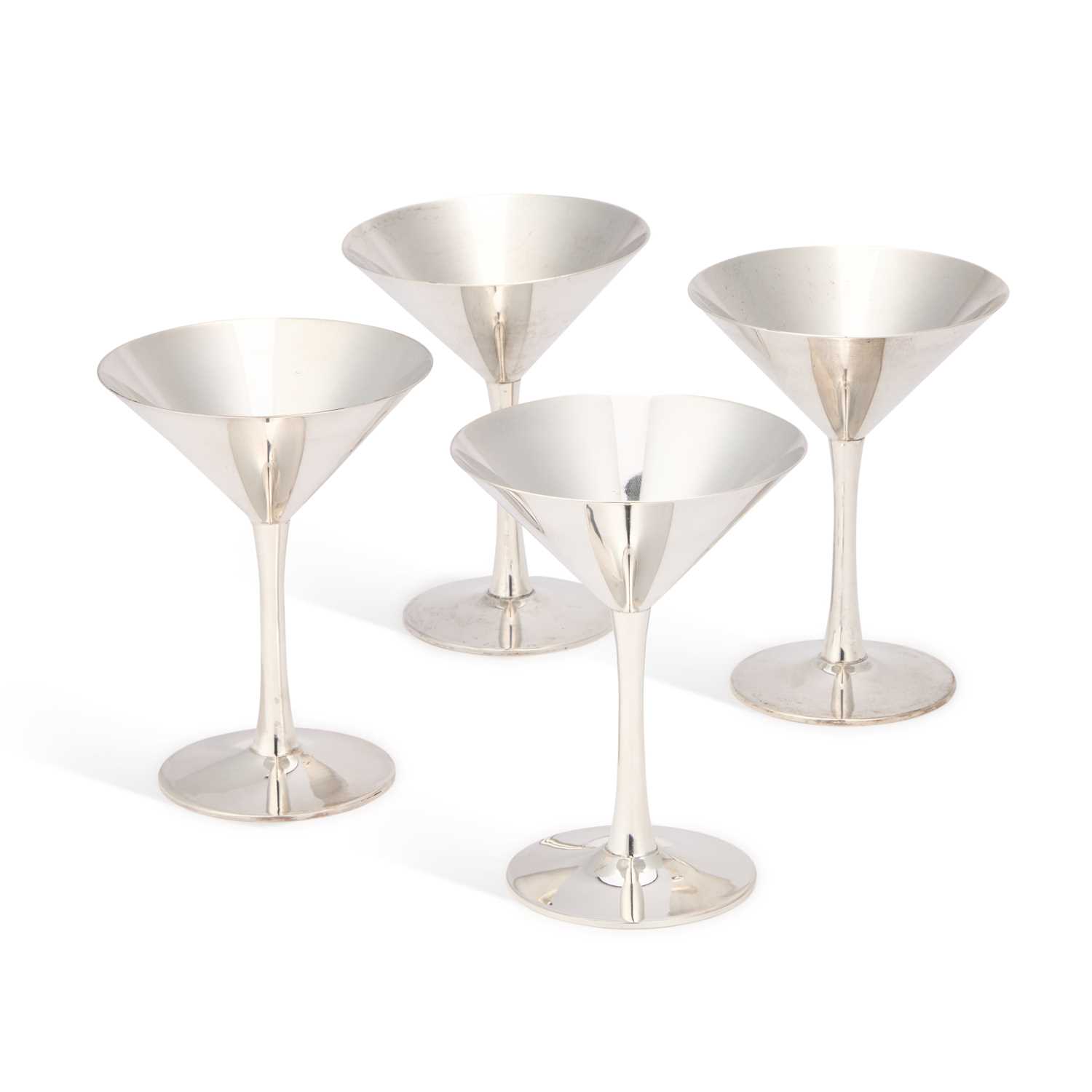 Lot 126 - CARTIER, A SET OF FOUR STERLING SILVER COCKTAIL COUPES