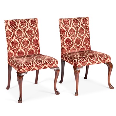 Lot 698 - A PAIR OF GEORGE II CARVED MAHOGANY AND UPHOLSTERED SIDE CHAIRS
