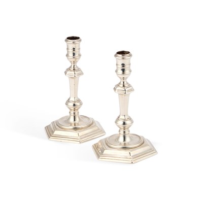 Lot 492 - A PAIR OF GEORGE I CAST SILVER CANDLESTICKS