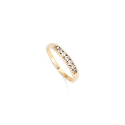 Lot 550 - AN 18 CARAT GOLD DIAMOND HALF HOOP RING
