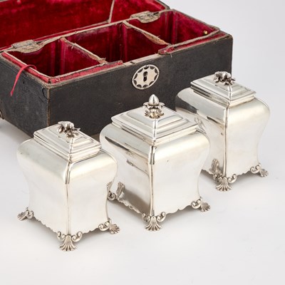 Lot 488 - A SET OF TWO CASED GEORGE III SILVER TEA CADDIES AND A SUGAR BOX