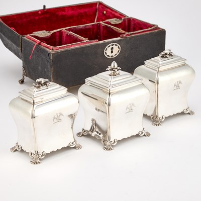 Lot 488 - A SET OF TWO CASED GEORGE III SILVER TEA CADDIES AND A SUGAR BOX