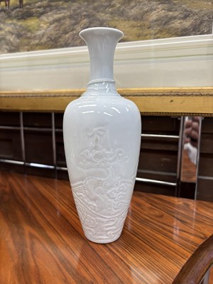 Lot 112 - A CHINESE WHITE-GLAZED PORCELAIN VASE