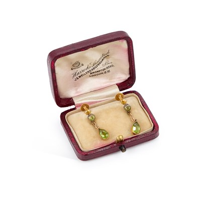 Lot 580 - A PAIR OF PERIDOT PENDANT EARRINGS
