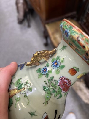 Lot 75 - A NEAR PAIR OF 19TH CENTURY CHINESE FAMILLE ROSE CELADON-GROUND PORCELAIN VASES