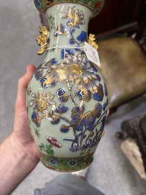 Lot 75 - A NEAR PAIR OF 19TH CENTURY CHINESE FAMILLE ROSE CELADON-GROUND PORCELAIN VASES