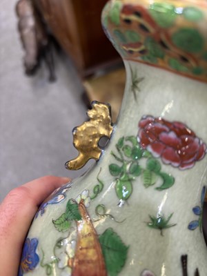 Lot 75 - A NEAR PAIR OF 19TH CENTURY CHINESE FAMILLE ROSE CELADON-GROUND PORCELAIN VASES