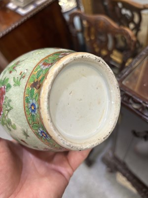 Lot 75 - A NEAR PAIR OF 19TH CENTURY CHINESE FAMILLE ROSE CELADON-GROUND PORCELAIN VASES