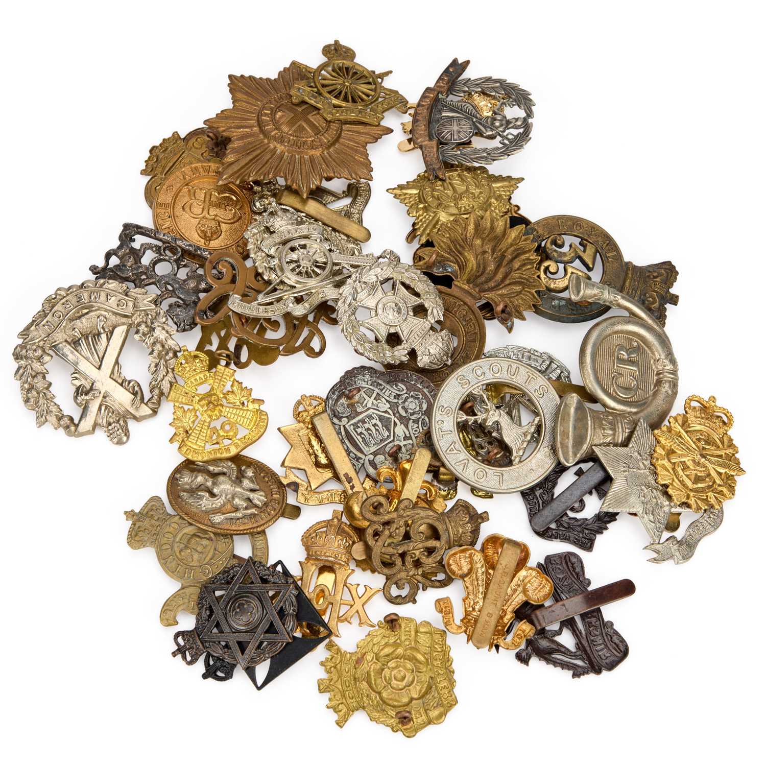Lot 17 - A GROUP OF RE-STRIKED CAP BADGES