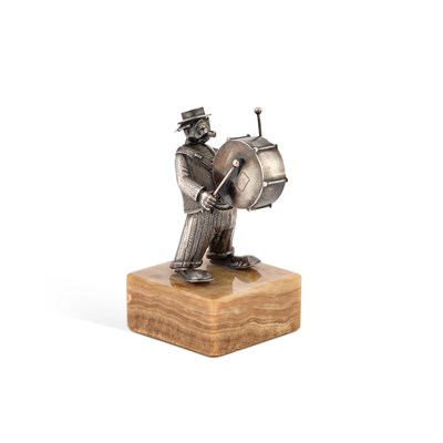 Lot 163 - A SPANISH SILVER FIGURE OF A DRUMMING CLOWN