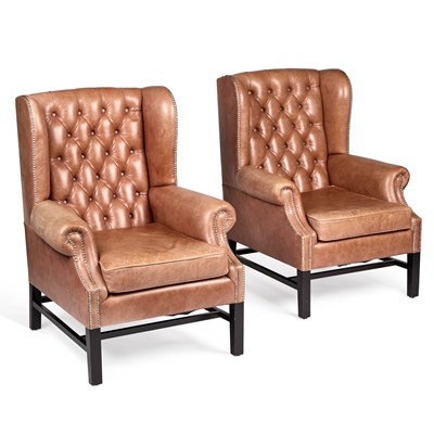 Lot 1019 - A PAIR OF GEORGIAN STYLE LEATHER-UPHOLSTERED WING-BACK ARMCHAIRS