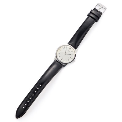 Lot 160 - A STEEL UNIVERSAL GENEVE STRAP WATCH