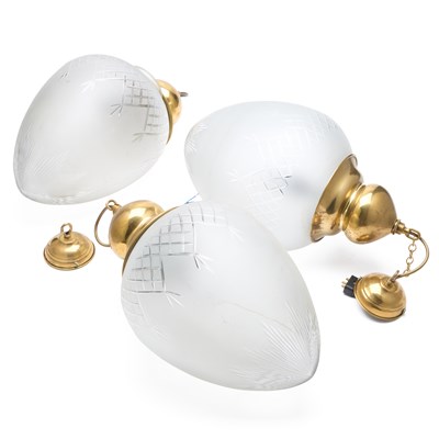 Lot 908 - A TRIO OF BRASS AND FROSTED GLASS PENDANT CEILING LIGHTS