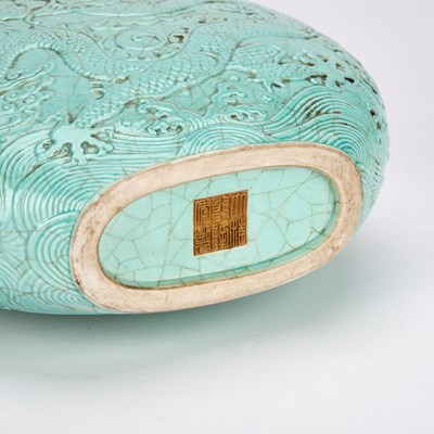 Lot 260 - A CHINESE TURQUOISE-GLAZED PORCELAIN 'DRAGON' MOONFLASK