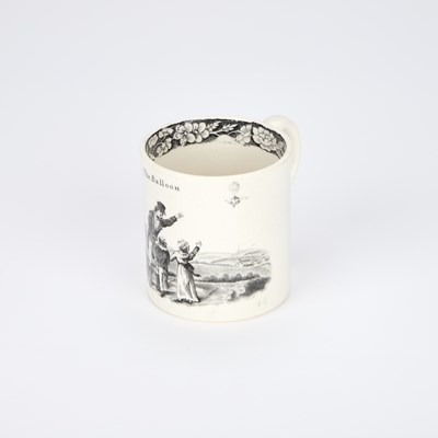 Lot 53 - A TRANSFER-PRINTED POTTERY CHILD'S MUG