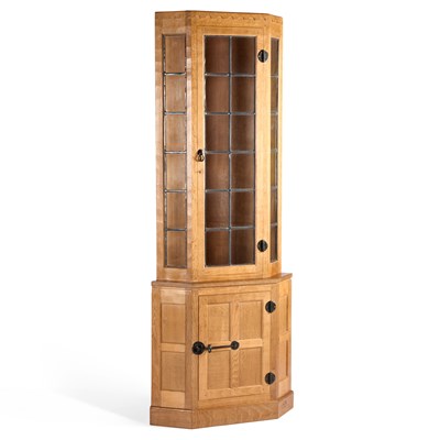 Lot 1132 - ROBERT THOMPSON OF KILBURN, A MOUSEMAN OAK STANDING CORNER CABINET
