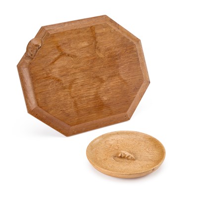 Lot 1140 - ROBERT THOMPSON OF KILBURN, A MOUSEMAN OAK BREADBOARD AND A NUT BOWL
