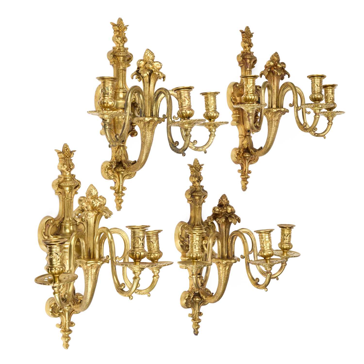 Lot 990 - A GOOD SET OF FOUR GILT-BRONZE THREE-LIGHT WALL SCONCES