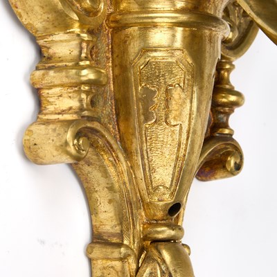Lot 990 - A GOOD SET OF FOUR GILT-BRONZE THREE-LIGHT WALL SCONCES