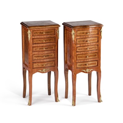 Lot 1072 - A PAIR OF FRENCH GILT-METAL MOUNTED AND STRING-INLAID FIVE-DRAWER CHESTS
