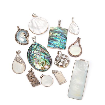 Lot 667 - A GROUP OF MOTHER-OF-PEARL AND ABALONE SHELL PENDANTS