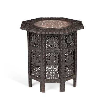 Lot 1098 - AN ANGLO-INDIAN CARVED AND IVORY-INLAID OCCASIONAL TABLE