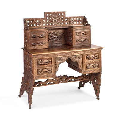 Lot 1085 - A CHINESE CARVED HARDWOOD DESK