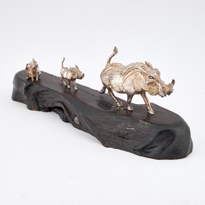 Lot 383 - PATRICK MAVROS: A SILVER SCULPTURE OF A WARTHOG FAMILY RUNNING