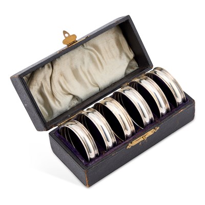 Lot 496 - A SET OF SIX VICTORIAN SILVER NAPKIN RINGS