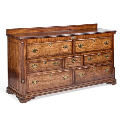 Lot 1027 - A GEORGE III OAK AND MAHOGANY MULE CHEST