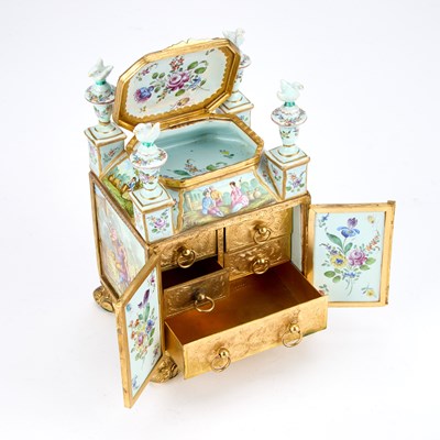 Lot 738 - A CONTINENTAL PORCELAIN TABLE CABINET