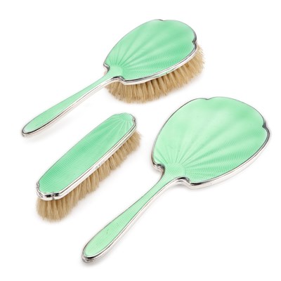 Lot 127 - AN ART DECO SILVER AND GREEN ENAMEL DRESSING TABLE SET