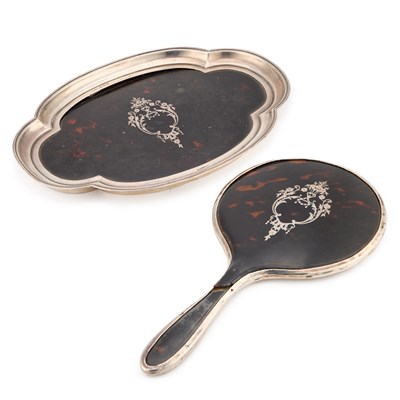 Lot 94 - A GEORGE V SILVER-MOUNTED TORTOISESHELL TRAY AND HAND-MIRROR