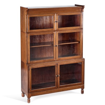 Lot 1051 - AN EARLY 20TH CENTURY WALNUT STACKING BOOKCASE