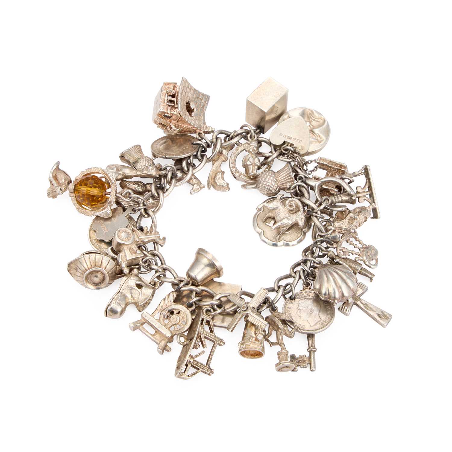 Lot 692 - A SILVER CHARM BRACELET