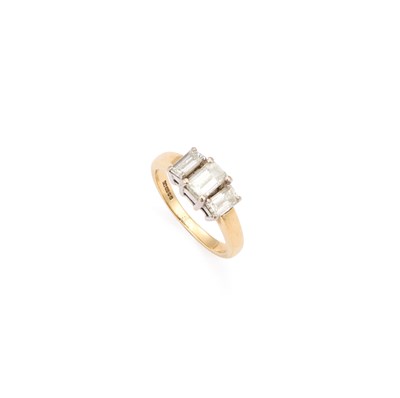 Lot 719 - AN 18 CARAT GOLD THREE STONE OCTAGONAL-CUT DIAMOND RING