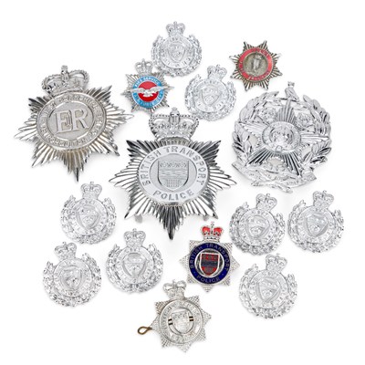 Lot 22 - A COLLECTION OF FIRE SERVICE AND POLICE HELMET PLATES AND BADGES