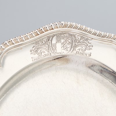 Lot 540 - A FINE SET OF TWELVE GEORGE III SILVER DINNER PLATES