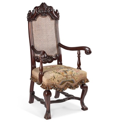 Lot 1036 - A 19TH CENTURY PORTUGUESE CARVED MAHOGANY AND CANEWORK ARMCHAIR